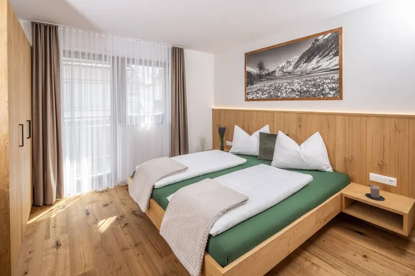 Appartamento 'Zum Sonnentor - Larix' con vista sulle montagne, balcone e Wi-Fi - Image 1