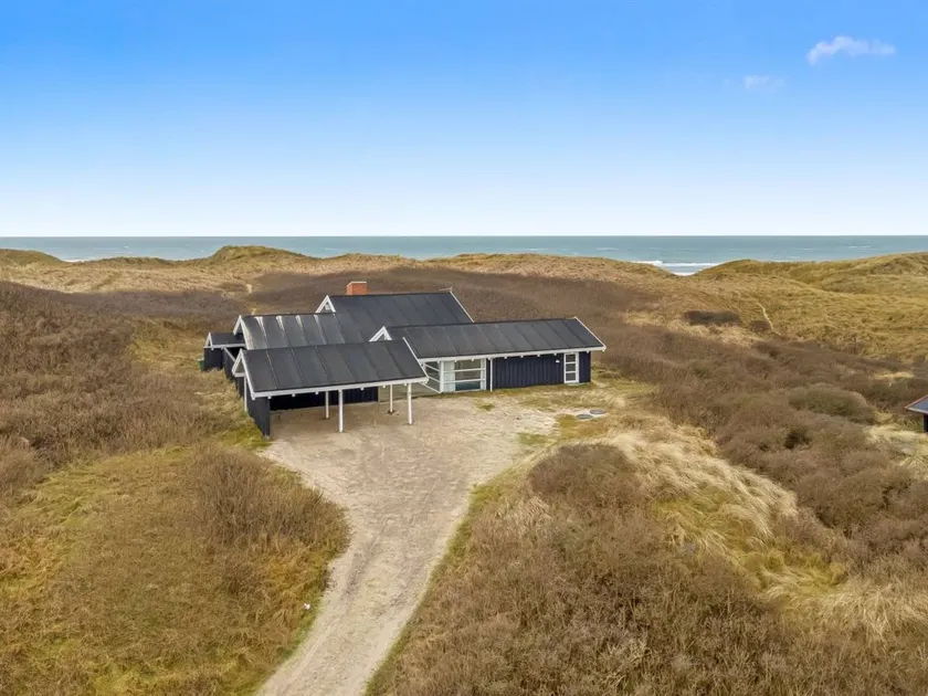 Holiday home with barbecue, private pool & sauna | Sea view - Image 1
