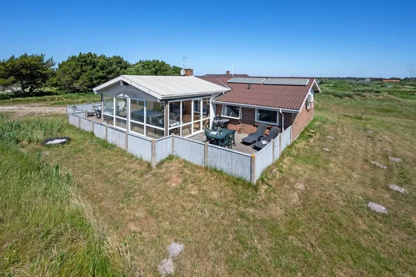 Holiday home with private pool, terrace & hot tub | Water view - Image 1