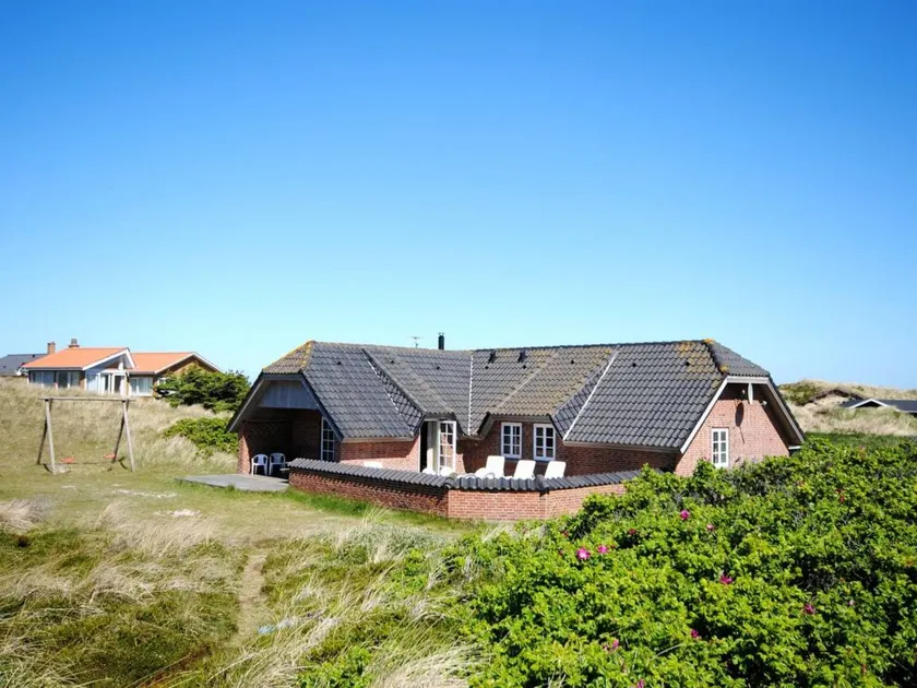 Child-friendly spacious holiday home with terrace & sauna | Next to the beach | Pets allowed - Image 1