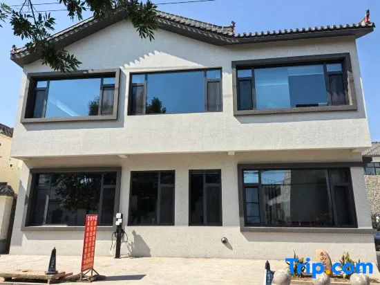 Helan Xiaozhu Homestay (Weishan Lake Tourist Area) - Image 1