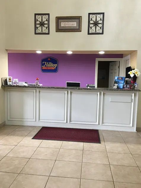 Hilltop Inn and Suites - Image 1