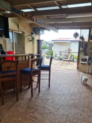 Open plan large home with outdoor patio and kitchen area - Image 1
