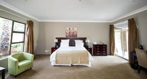 WoodRidge Palms Boutique Hotel - Image 1