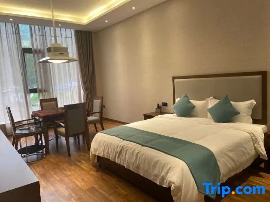 Xinqi Zhouji Hotel - Image 1