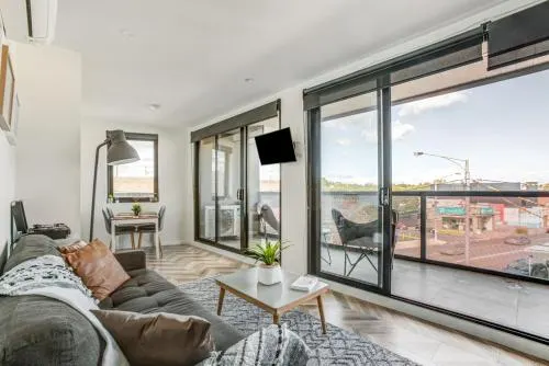 201/131 Plenty Rd, Preston  · Contemporary Apt, cafes, wifi, trams & parking - Image 1
