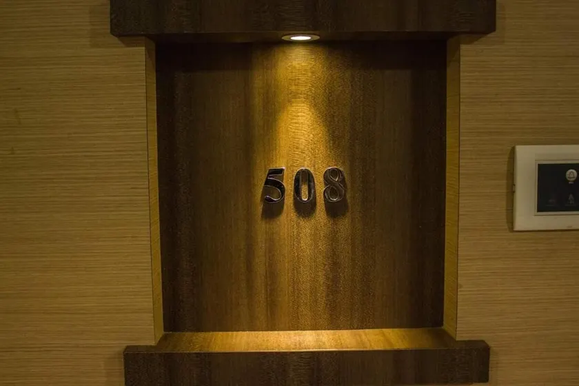 OYO Premium Navi Mumbai Palm Beach Road - Image 1