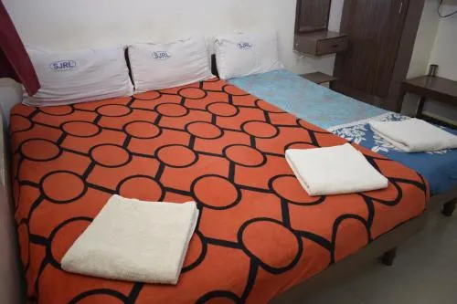 Hotel Akil Towers by OYO Rooms - Image 1