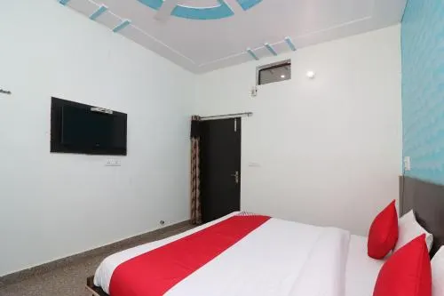 OYO 26920 Dev Hotel - Image 1