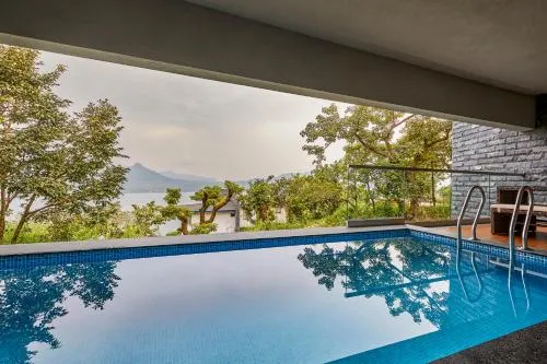 SaffronStays Yahvi Waters by Kosha Villas - 2-BR villa near Pawna Lake with infinity pool and bonfire setup - Image 1