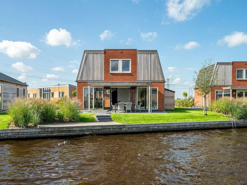 Holiday Home With Private Jetty on Water - Image 1