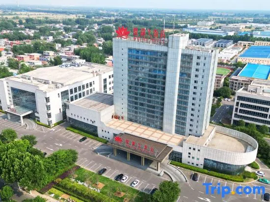 Blue Horizon Junhua Hotel - Image 1