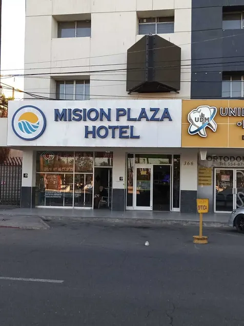 Capital O Baja Place Inn - Image 1