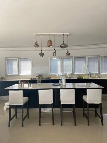 Beautiful apartments near the beach in a house with a pool - Image 1