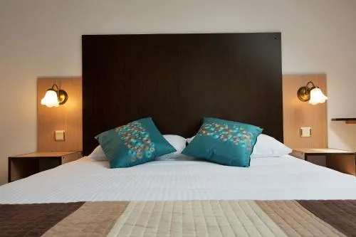 Times Inn Rooms and Apartments - Image 1