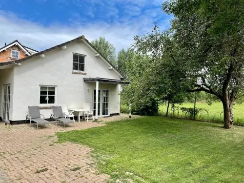 Cozy Holiday Home in Spijk with Meadow View - Image 1