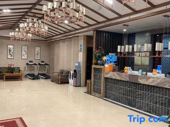 Xingyi Qiaofu Hotel - Image 1