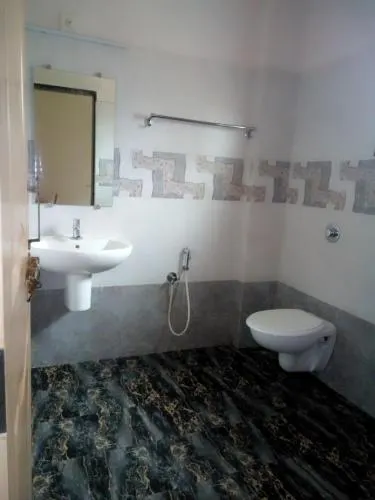 Hotel Kateel International by OYO Rooms - Image 1