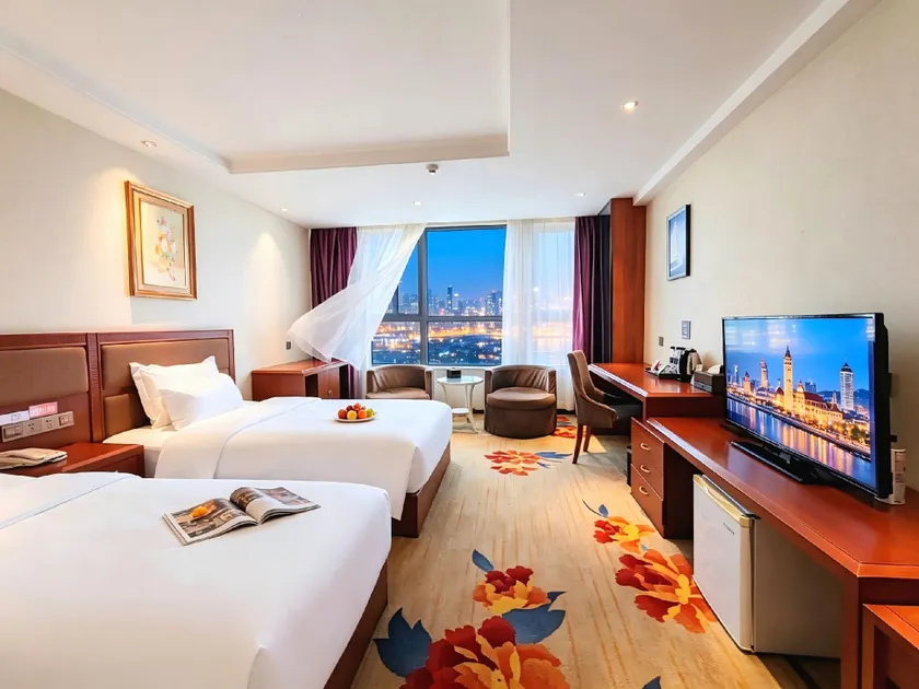 Mingdu Gloria Plaza Hotel Qingdao - Image 1