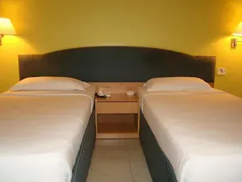 Townhouse Oriental INN - Image 1