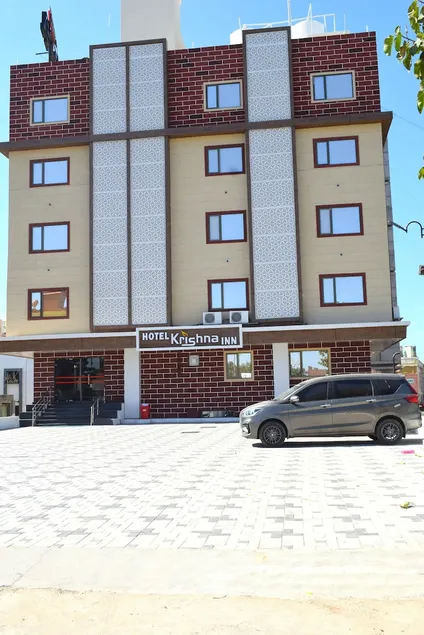 Hotel The Grand Krishna Inn - Image 1