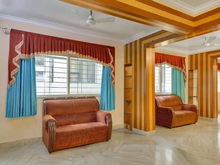 Oyo 12301 Rg Suites - Image 1