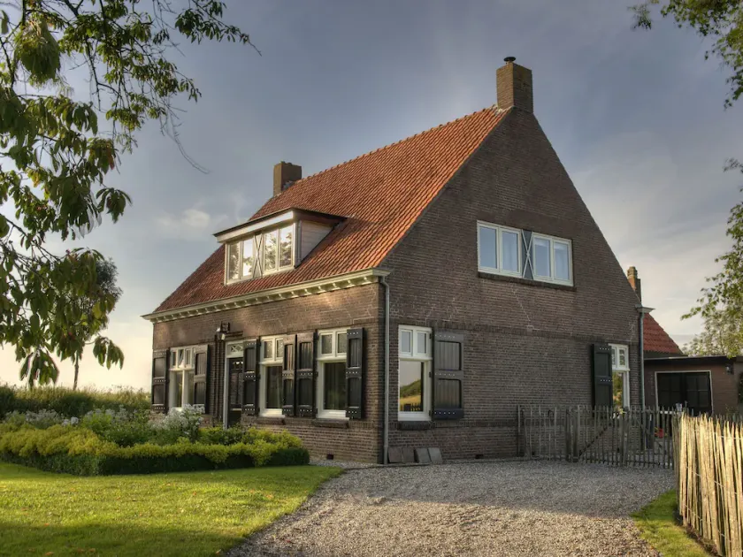 Spacious Farmhouse in IJzendijke with Garden - Image 1
