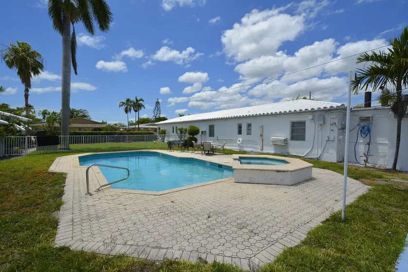 Hallandale Beach Apartments pool and parking - Image 1