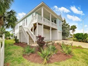 Mermaid Haven - Stylish Luxury Home In Kure Dunes. Enjoy The Sun Or Shade With Both A Covered Screened In Porch As Well As A Sunning Deck! 4 Bedroom Home by Redawning - Image 1