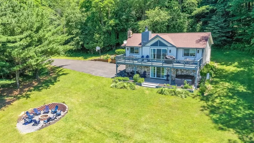 Maison avec barbecue et jacuzzi | Vue sur l'eau - Image 1