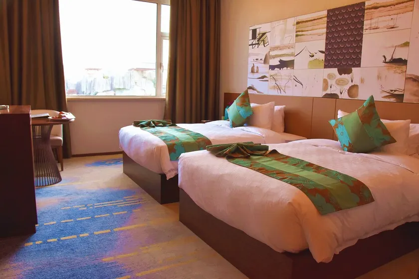 Swan Lake Resort Hot Spring Jiangba - Image 1