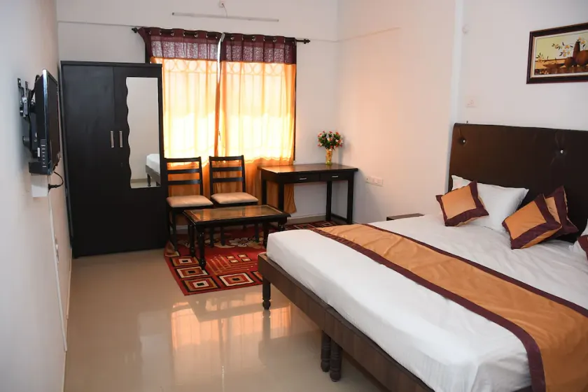 JK Rooms 132 Parkland Service Apartment - Image 1