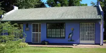 Lilac Lodge-Purple House - Image 1