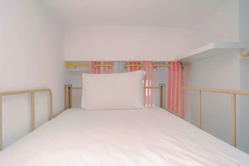 Green Bay Pluit Studio Apartment with 2 Single Beds by Travelio - Image 1