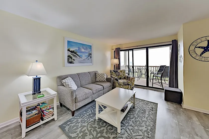 Charmant appartement en copropriété entièrement équipé avec barbecue et piscine | Vue plage | Plage à proximité - Image 1