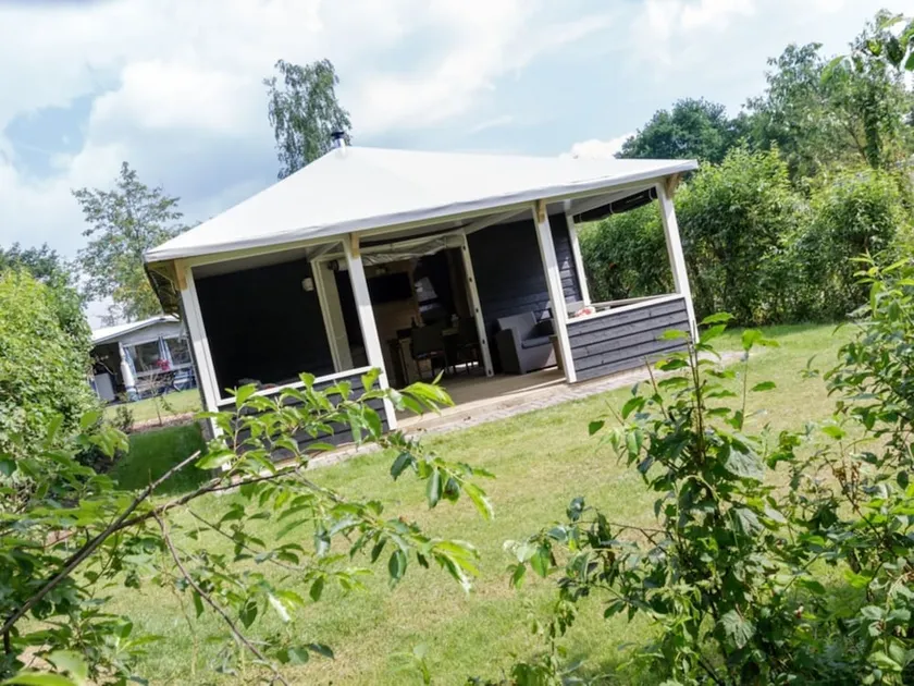 Cozy tentlodge with roofed terrace in a green area - Image 1