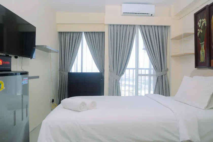 Comfy with City View Studio at Tifolia Apartment - Image 1