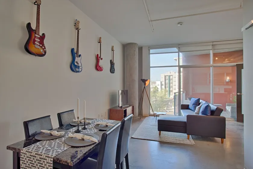Artsy Chic 1BR Condo 30day min with WiFi AC Parking TV Furnished Rooftop - Image 1