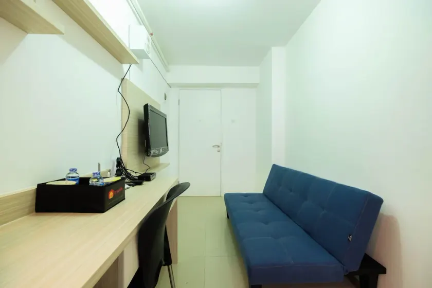 1BR with Sofa Bed at Bassura City Apartment By Travelio - Image 1
