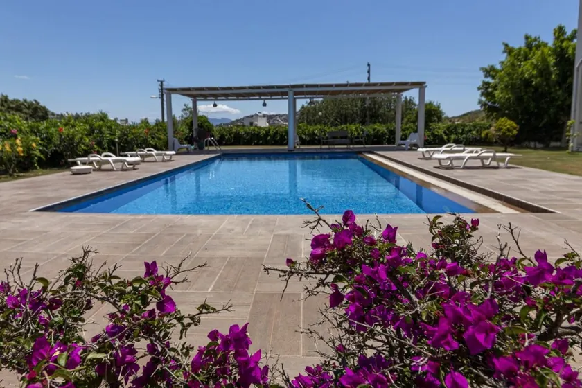 Captivating House with Shared Pool and Central Location in Gumusluk, Bodrum - Image 1