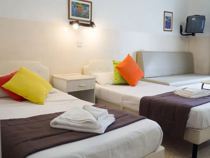 Huli Hotel & Apartments - Image 1