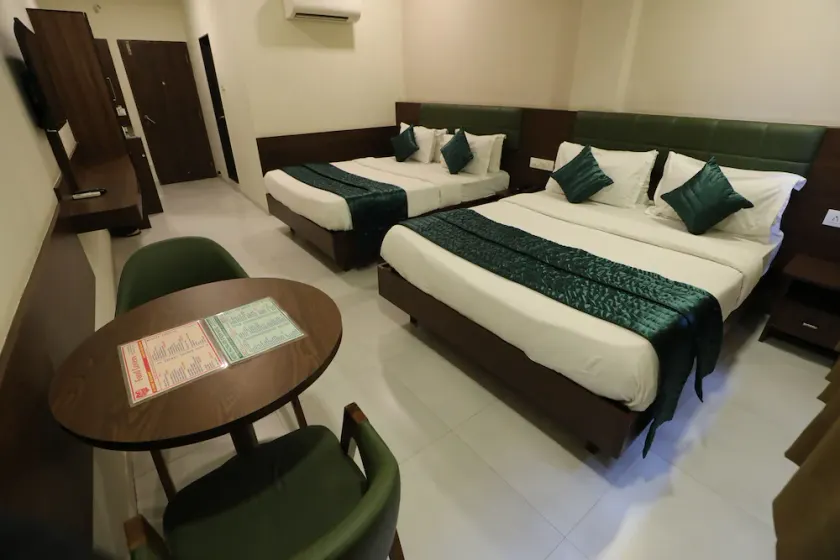 GreenOtel Room Surat - Image 1