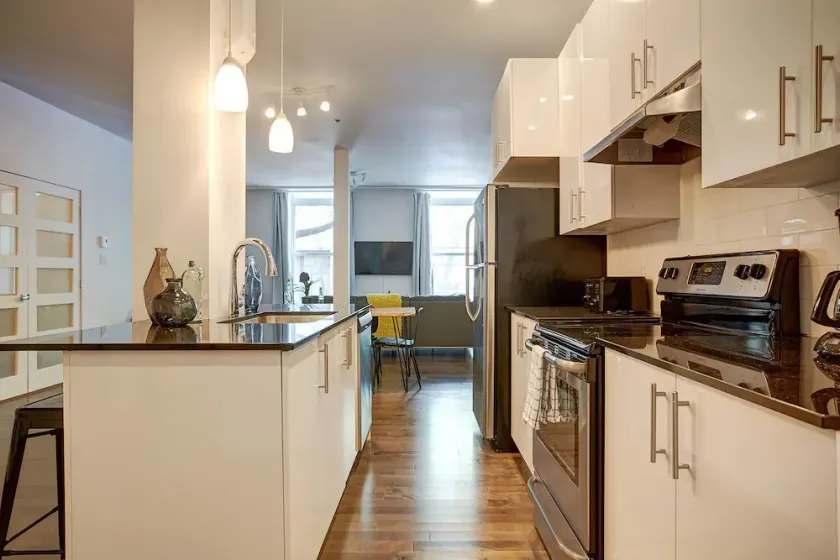 NEW Huge Industrial Loft Near Mont-Royal Metro by Den Stays - Image 1