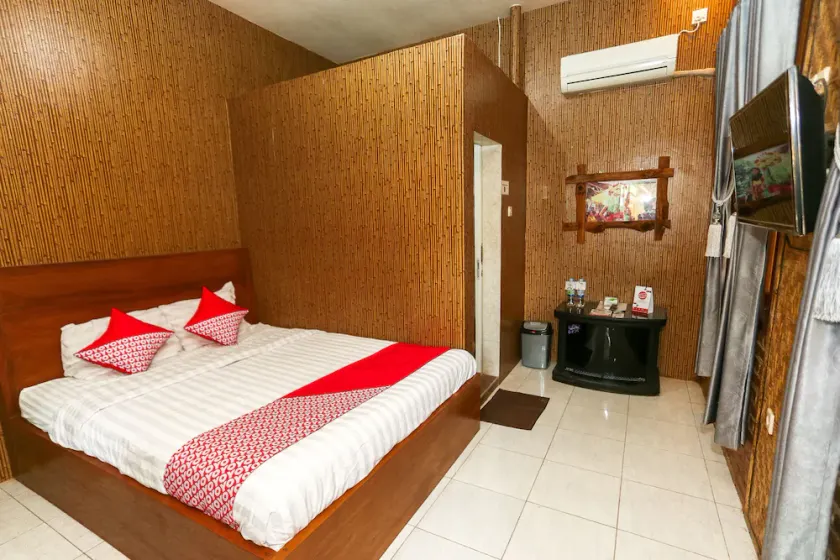 OYO 1230 Kampoeng Osing Syariah Guesthouse - Image 1