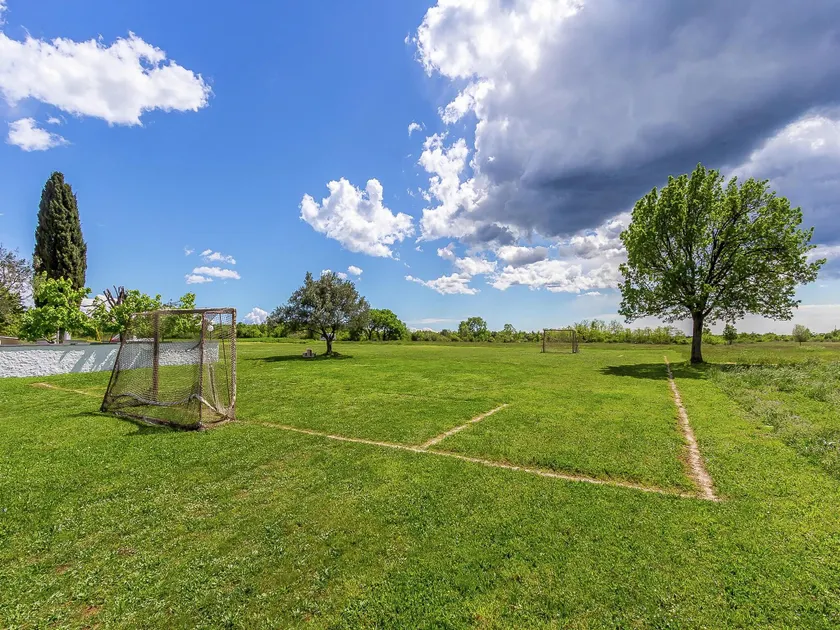 Apartment in Gajana with Mini Football Field - Image 1