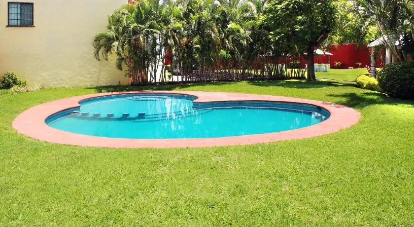 Casa Palmera con Aire acondicionado Alberca Wifi cocina y TV - Image 1