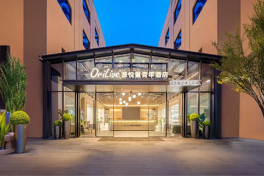Dongguan Guomao Yuanyueli Youth Hotel - Image 1