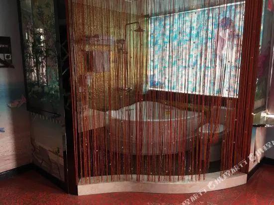 Ai Jiu Hotel - Image 1
