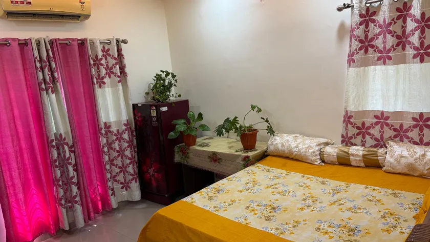 Eastern Bedroom with separate Refrigerator - Image 1