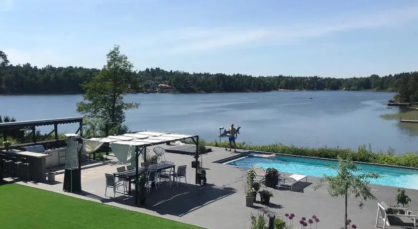 Exclusive Lakefront Mansion with pools in Stockholm - Image 1
